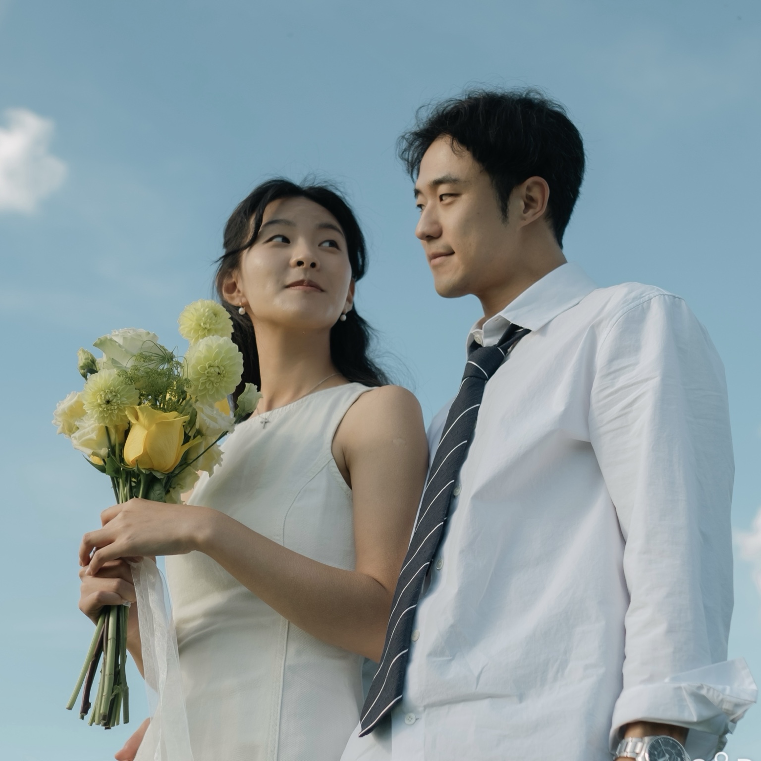 Together beneath a blue sky