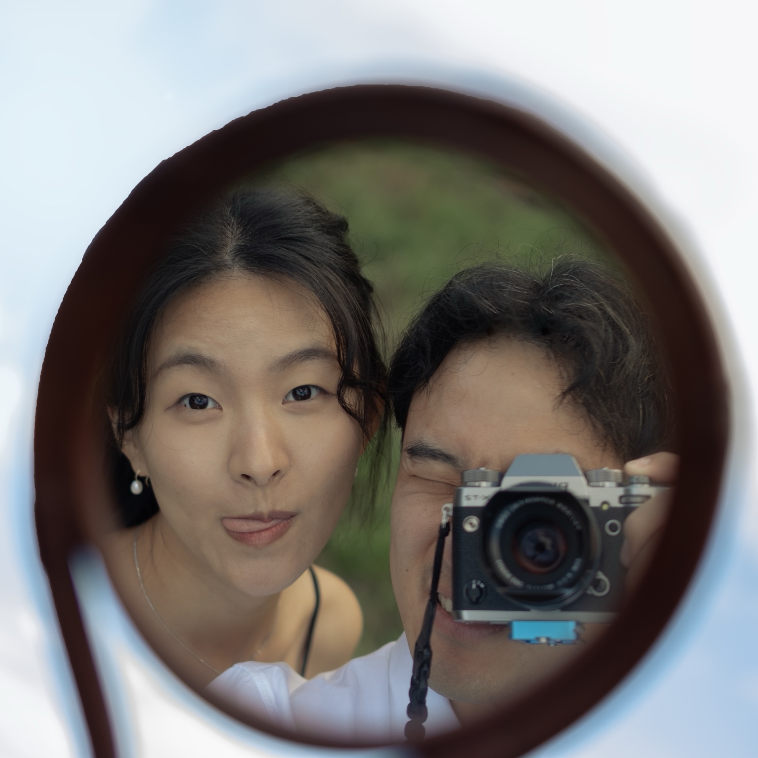 Our camera reflected in a round mirror